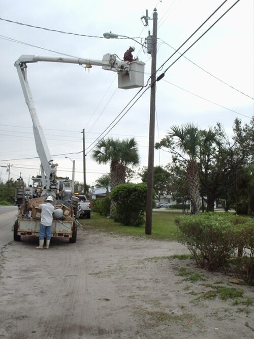 Lineman repairing powerline